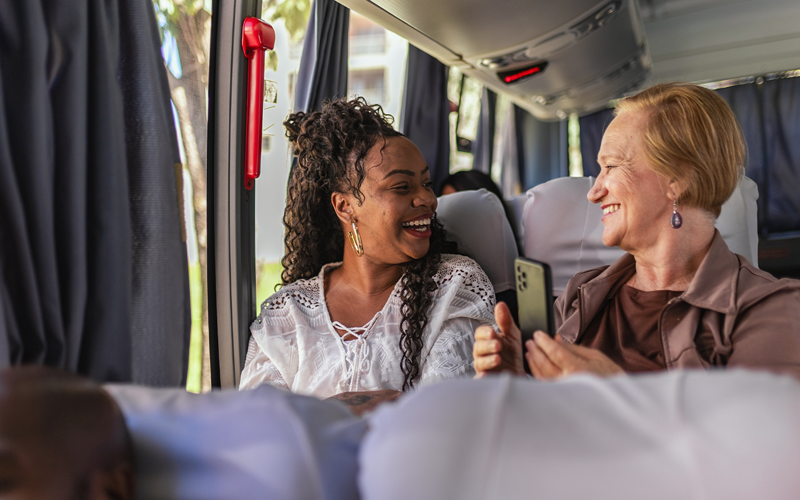 Customer on air-conditioned bus during Herculaneum half-day tour from Naples.